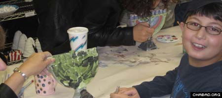 Children with special needs make Chanukah menorahs at a Hebrew school operated by Chabad-Lubavitch of Brookville, N.Y.